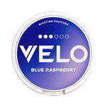 Velo Blue Raspberry nicotine pouch with bold berry flavor in a sleek purple-blue can
